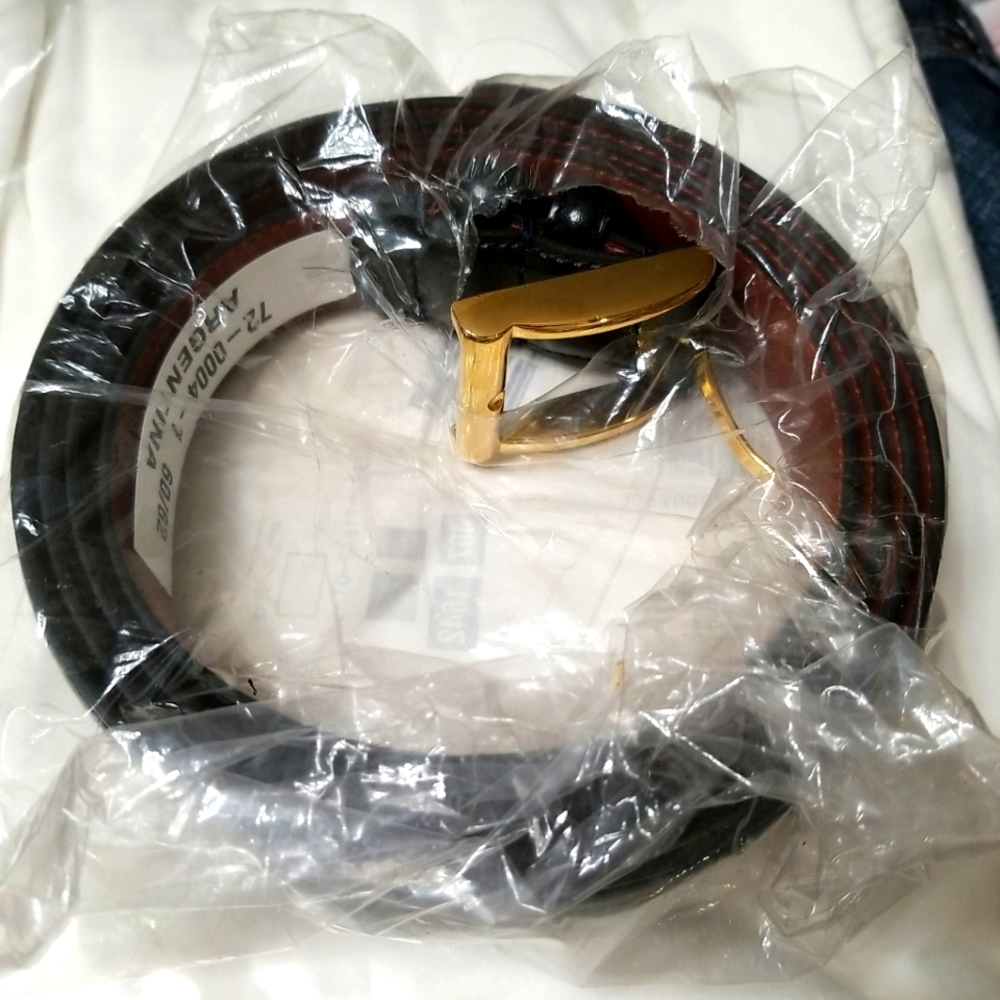 Mans black leather belt sz 60/62 new with tags.